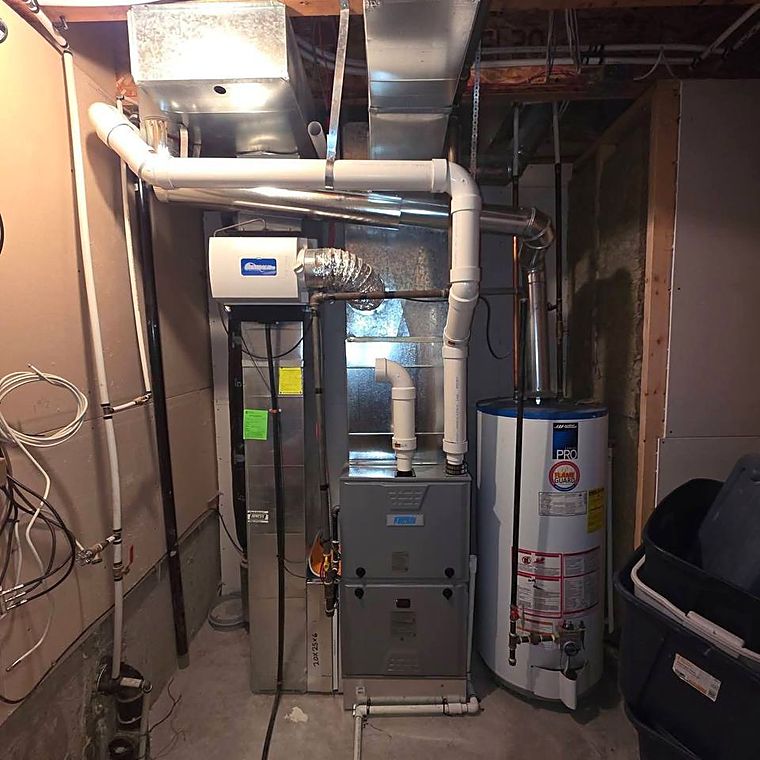A furnace and hot water tank installed together